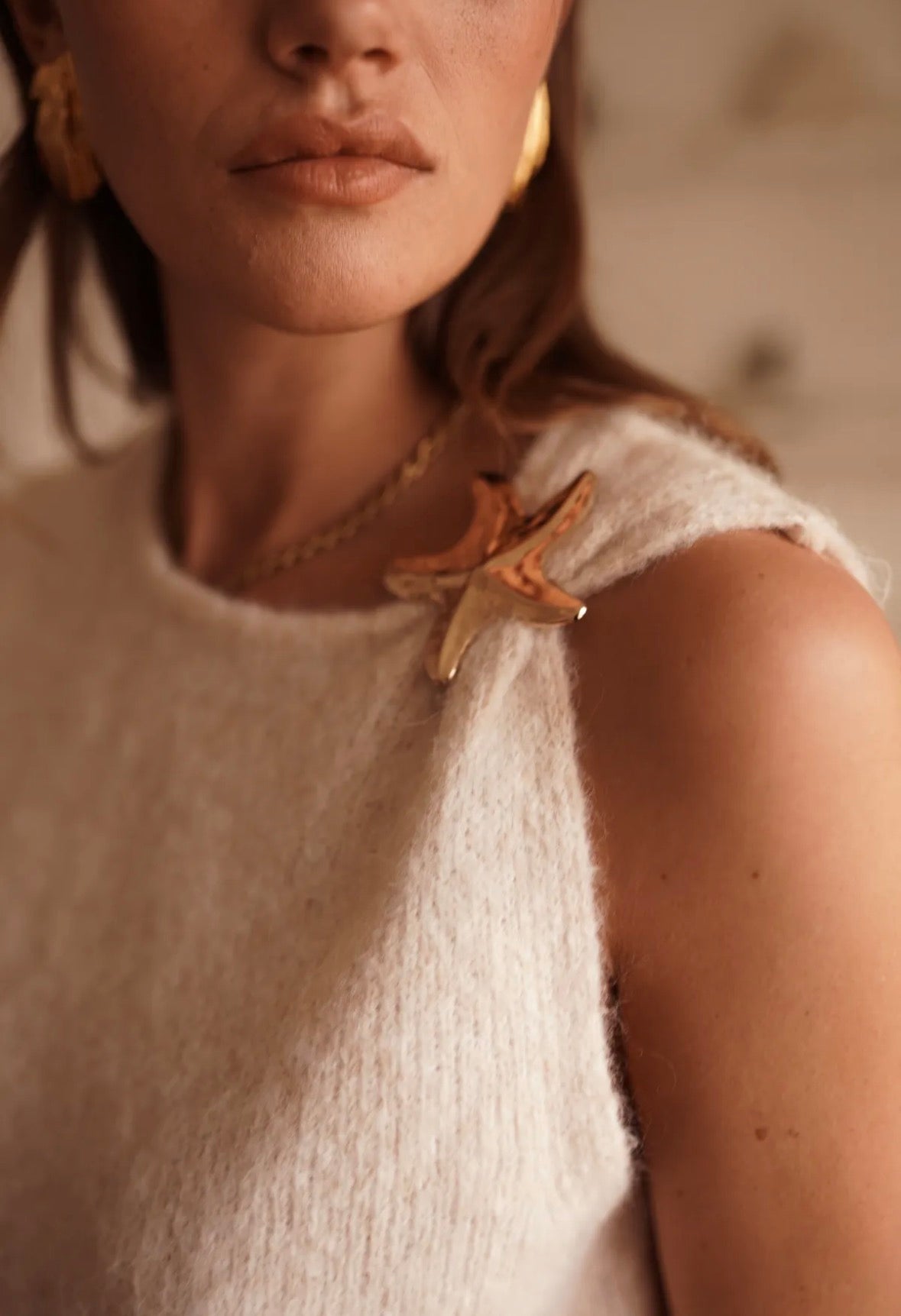 Väst stickad beige med sjöstjärna Onesize