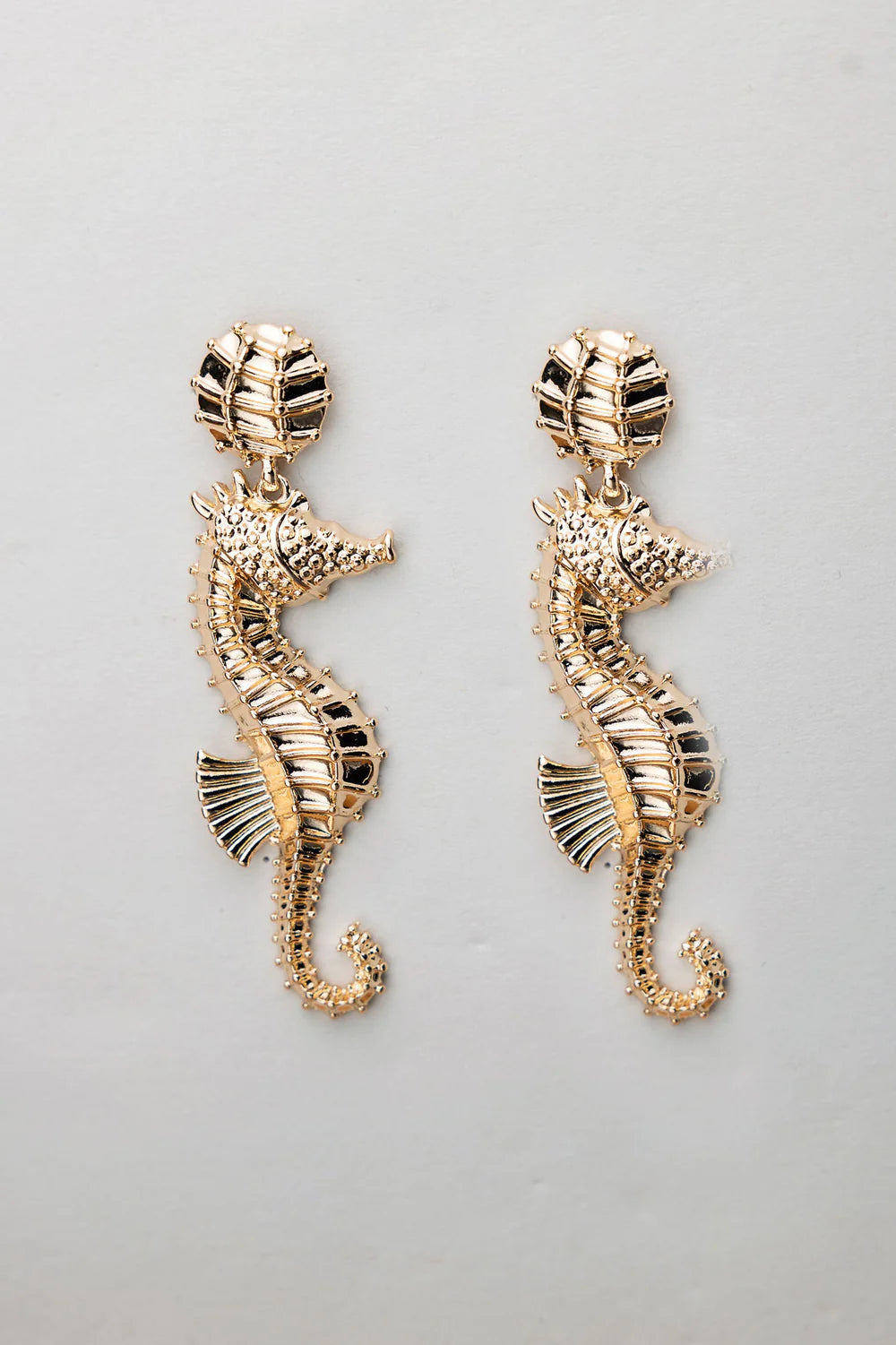 Seahorse earrings gold