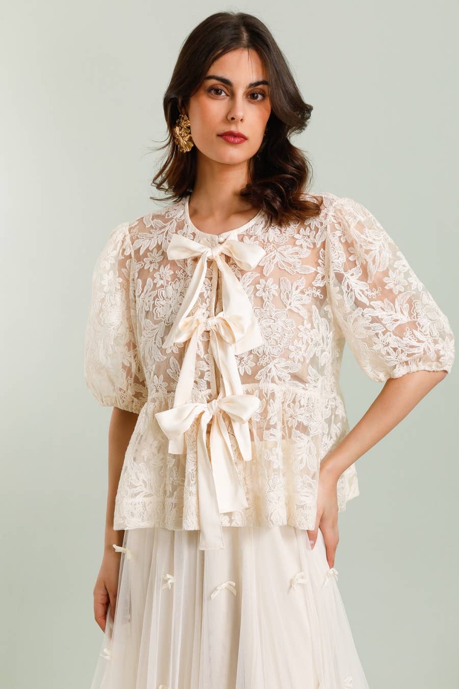 Minnie Peplumtopp i spets med satinsnörning Creme